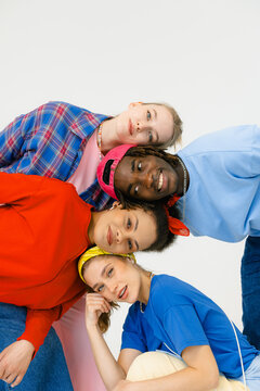A group of people posing in a studio