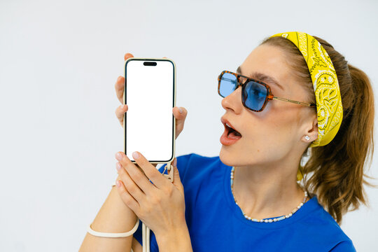 Portrait of a woman with white-screen mobile phone