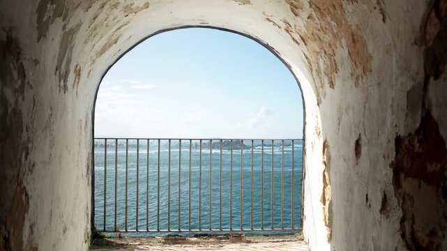 Large window looking towards Isla de Cabras and San Juan Bay, at San Felipe del Morro castle, Old San Juan, Puerto Rico.