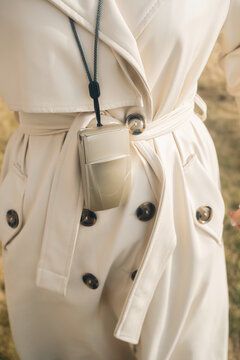 Vintage camera hanging on a strap