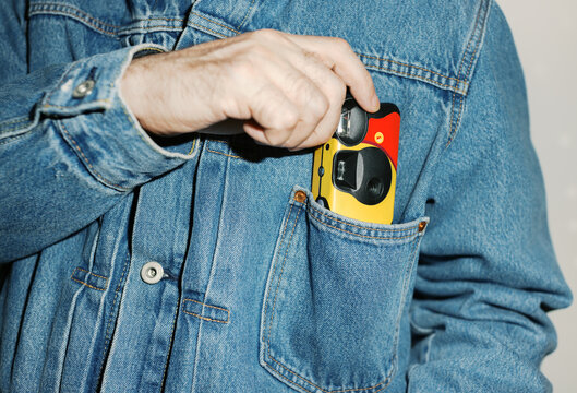 Disposable camera in the pocket