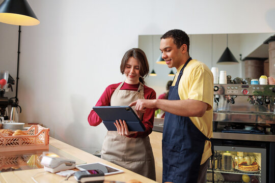 Small Business Baristas Using Tablet