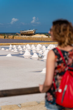 An anonymous woman looking at the View of a Saline 