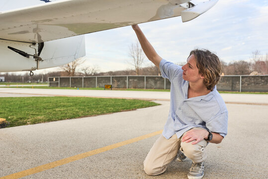 Student pilot checking wings