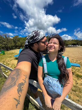 Surprise kiss under the sun