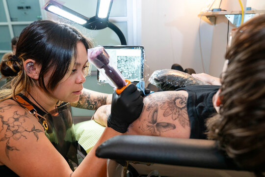 tattoo artist at work
