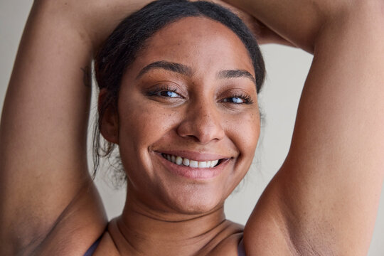 Young woman with no makeup in studio 