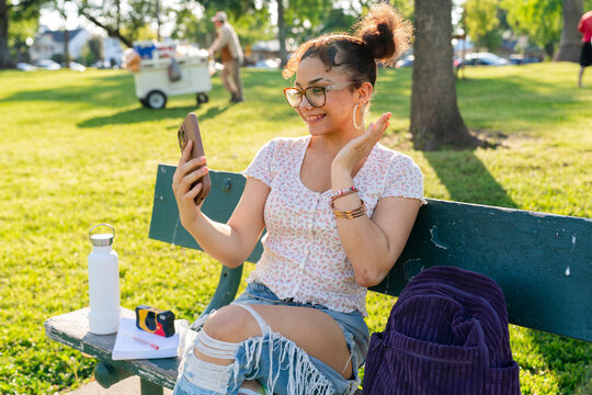 student using smartphone outside