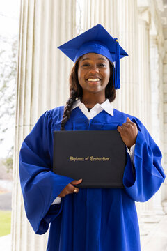 Black Teenager school proud hold diploma 