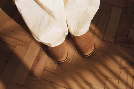 Anonymous woman in brown shoes