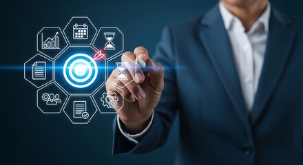 Businessman drawing goal target with management icons on virtual screen