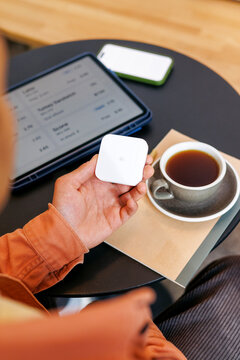 Hand Holding Wireless Card Reader