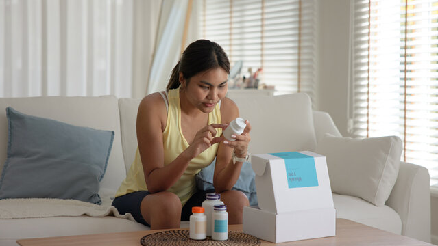 Young asia people woman buy custom tailor made anti aging pill bottle diet immune plan online health care shop open gift box weight loss herbal. Unbox order store clinic home service life balance.