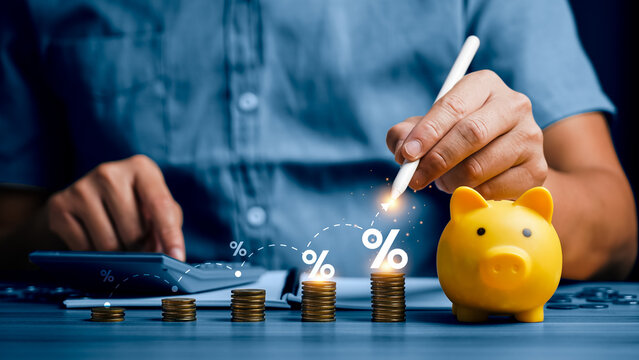 Financial planning and savings growth strategy with piggy bank, stacked coins and percentage increase icons, professional using calculator, digital pen for wealth accumulation, interest rate analysis