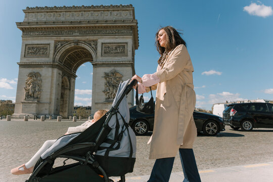 Strolling past Arc de Triomphe