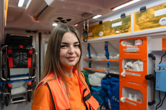 paramedic smiling inside ambulance
