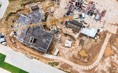 construction of residential building. installation of the metal grid for filling by concrete. aerial view.