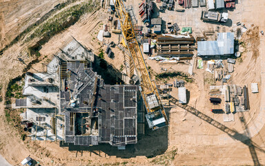 construction site from above. apartment building during early stage of construction. aerial top view.