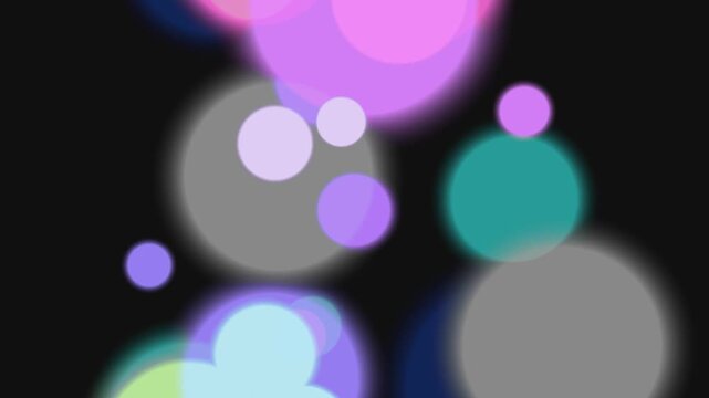 Colorful Blurred Circles on Black Background.