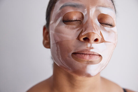 Woman wearing a cosmetic face mask 