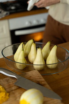 Peeled pears on counter