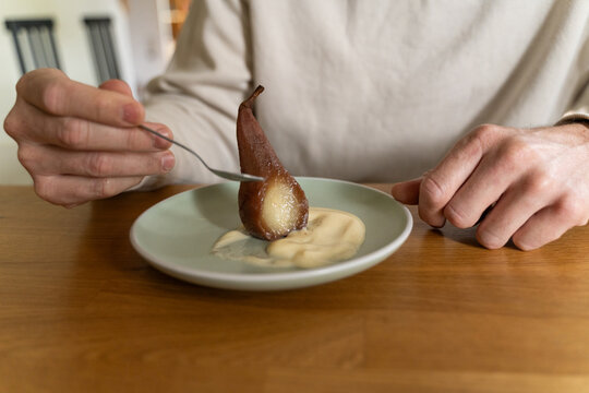 Eating pear dessert