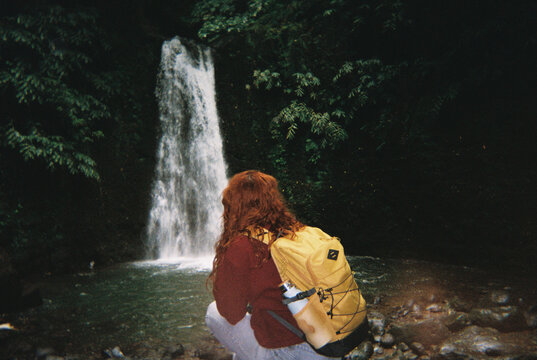 Waterfall forest woman