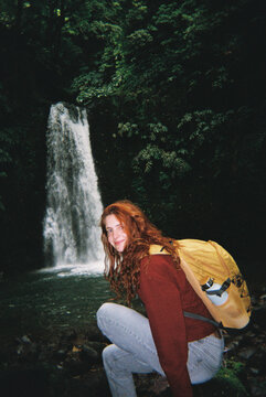 Waterfall forest woman