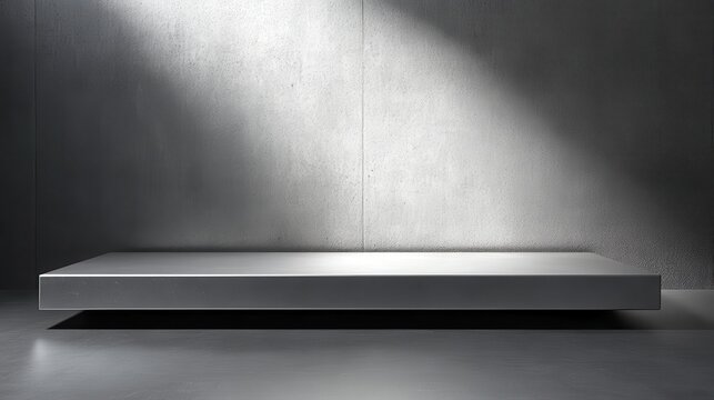 Sleek modern studio display shelf with dramatic lighting and textured concrete backdrop