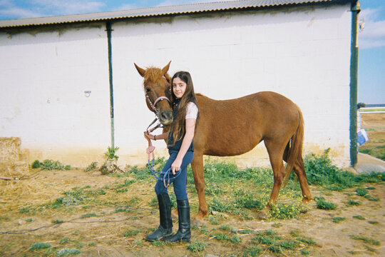 Portrait With Pony at Stable
