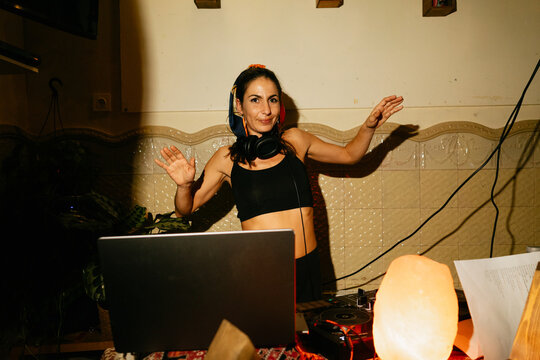 DJ Playing Music in Cozy Setting