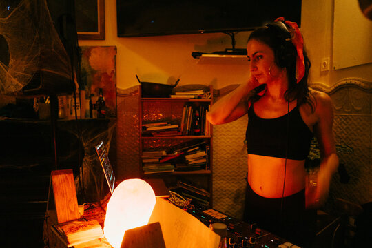 DJ Mixing at Vibrant Indoor Event