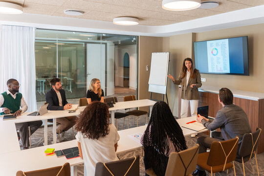 Businesswoman Giving Data Presentation