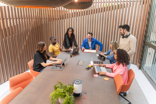 Diverse Team Meeting Around Conference Table