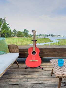 Porch Guitar on deck with view of Chesapeake Bay 