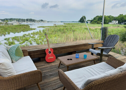 Porch Guitar on deck wide angle  view of Chesapeake Bay 