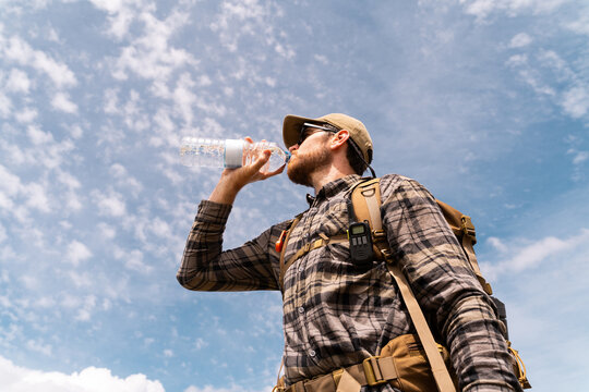 Hiker drinking water
