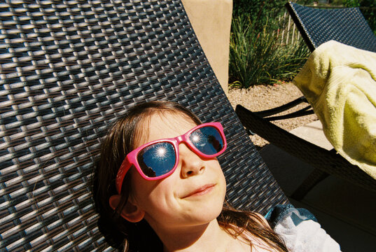 Film portrait of sunny day girl