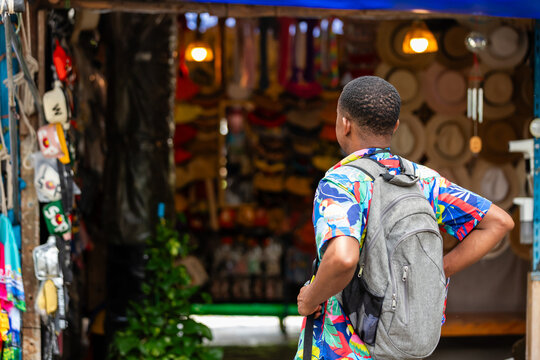 Colorful tourist exploring a vibrant street market in Thailand