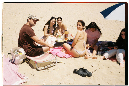 Father and Daughters at the Beach
