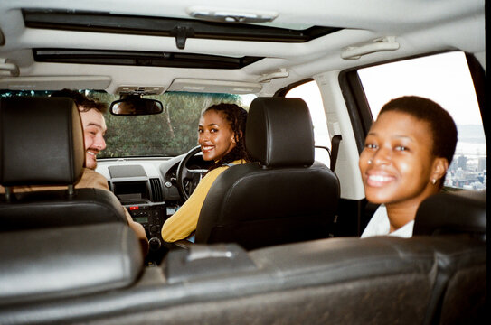 Friends Hanging Out in a Parked Car