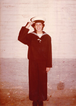 Sailor Woman Posing Confidently in Vintage Naval Uniform