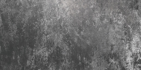 Obraz premium A monochromatic heavily wall textured background shows a distressed surface with various shades of gray and dark tones
