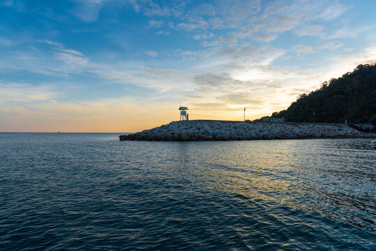 sunrise seascape with tower observation old small Located , in the khao laem ya - mu ko samet National Park ,Thailand.