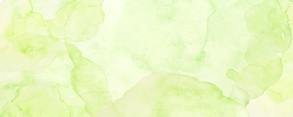 黄色の水彩絵の具で描いたグリーンの花びらの背景