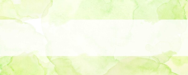 黄色の水彩絵の具で描いたグリーンの花びらの背景