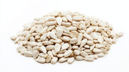 Fototapeta premium Pile of hulled white sunflower seeds ready to eat as a healthy raw snack on a white background