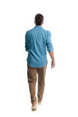 Fototapeta premium Casual man walking away