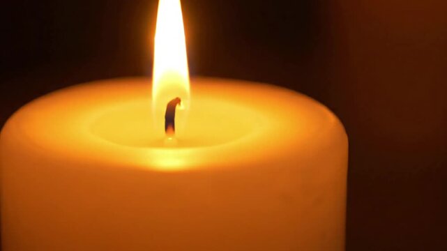 Isolated Object in Firelight A single, aesthetically pleasing, non-human object (e.g., a handcrafted ceramic mug, a pile of smooth river stones, a small, unlit lantern) bathed in the described top