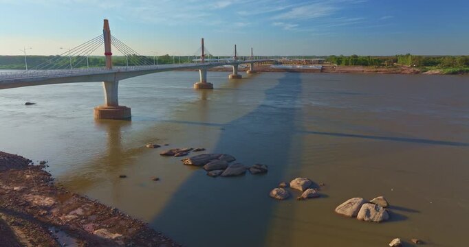 Aerial view of Friendship Bridge connecting Bueng Kan, Thailand, and Bolikhamxay, Laos, marks a new chapter in Mekong River travel. This strategic crossing enhances tourism, trade, and cultural